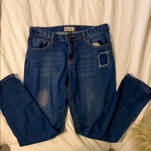 So size 7 “ripped” distressed jeans